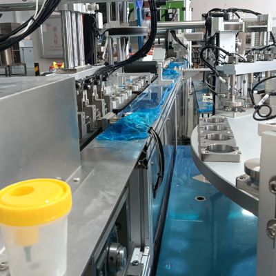 Good price Non-standard automated urine cup assembly machine, labelling and packaging integrated machine, high efficiency online