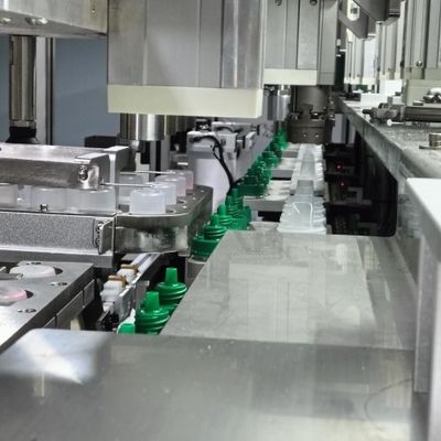Laundry Detergent Cap Assembly Machine For Simultaneous Assembly Of Two Sizes Of Products